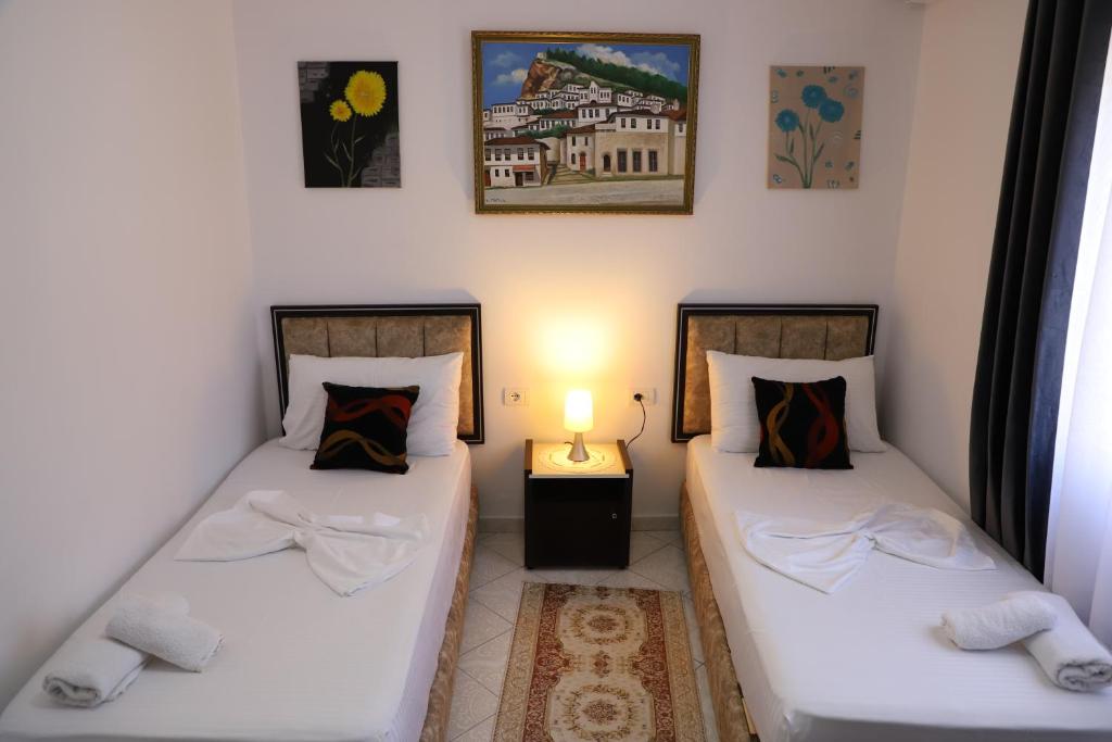 Postel nebo postele na pokoji v ubytování Guest House Marjo