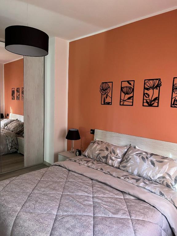 Postel nebo postele na pokoji v ubytování Fuga dalla Citta App Paglia