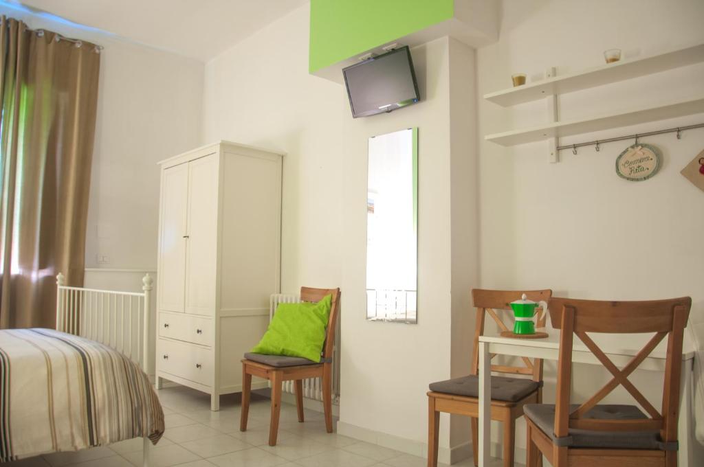 TV a/nebo společenská místnost v ubytování B&B Le Comari Salentine