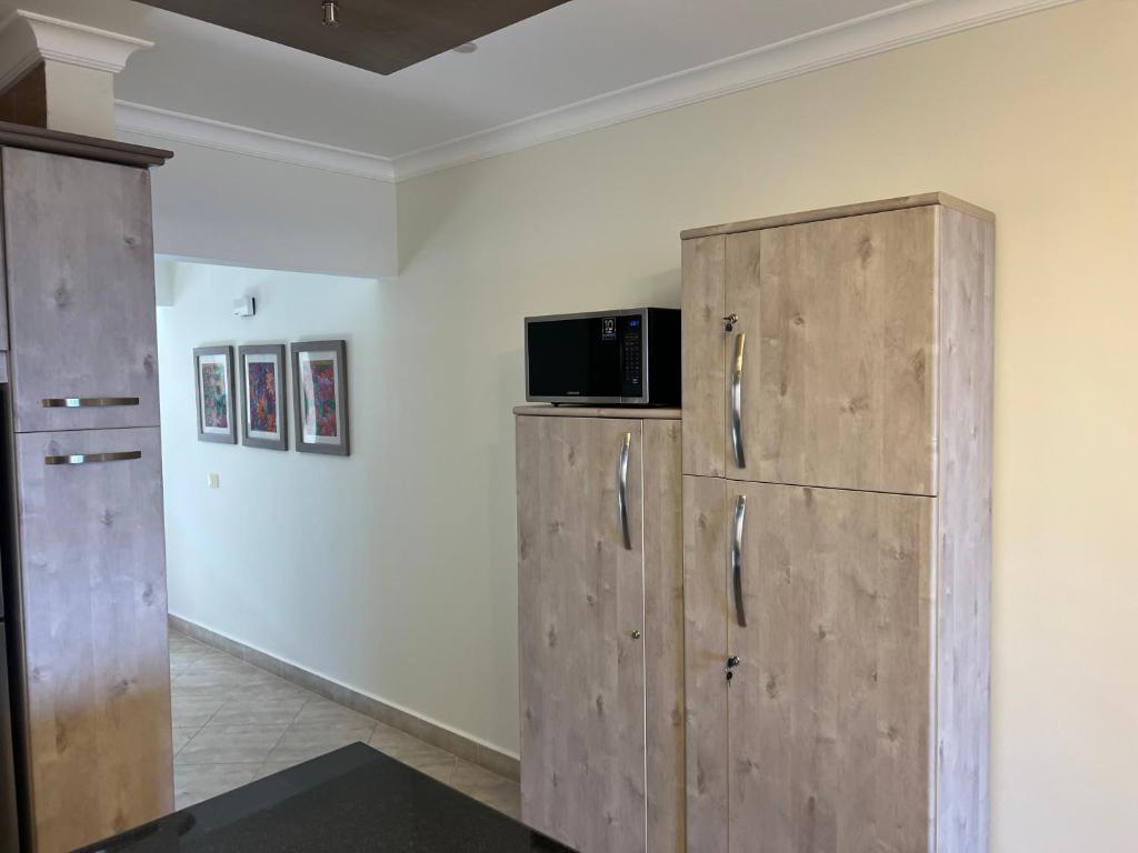TV a/nebo společenská místnost v ubytování Telal breeze villa