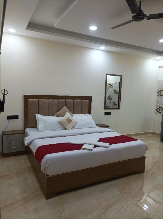 Postel nebo postele na pokoji v ubytování Hotel Small Daddy INN