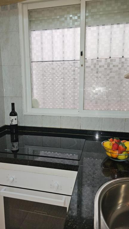 A kitchen or kitchenette at Ideal Holiday Apartment City Center