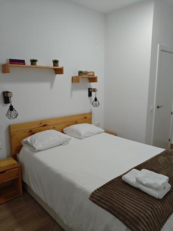 Postel nebo postele na pokoji v ubytování Precioso apartamento junto al casco histórico