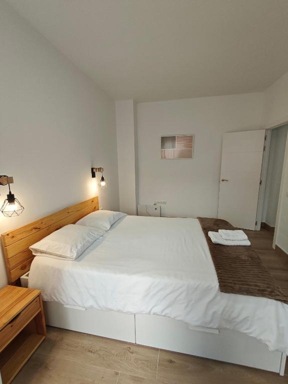 Postel nebo postele na pokoji v ubytování Precioso apartamento junto al casco histórico