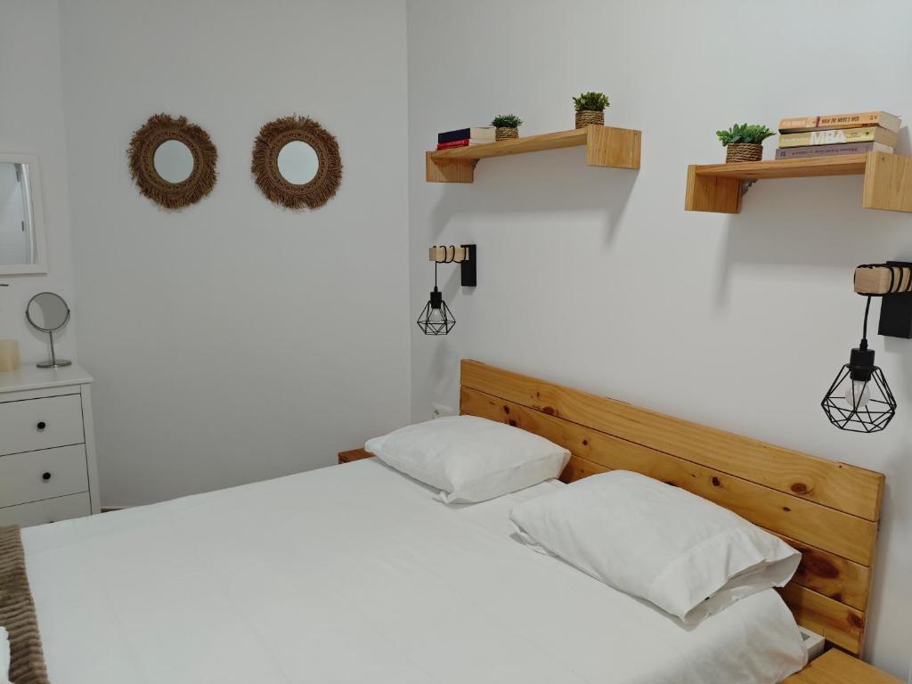 Postel nebo postele na pokoji v ubytování Precioso apartamento junto al casco histórico