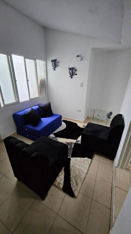 Posezení v ubytování Lindo y cómodo apartaestudio La bastilla