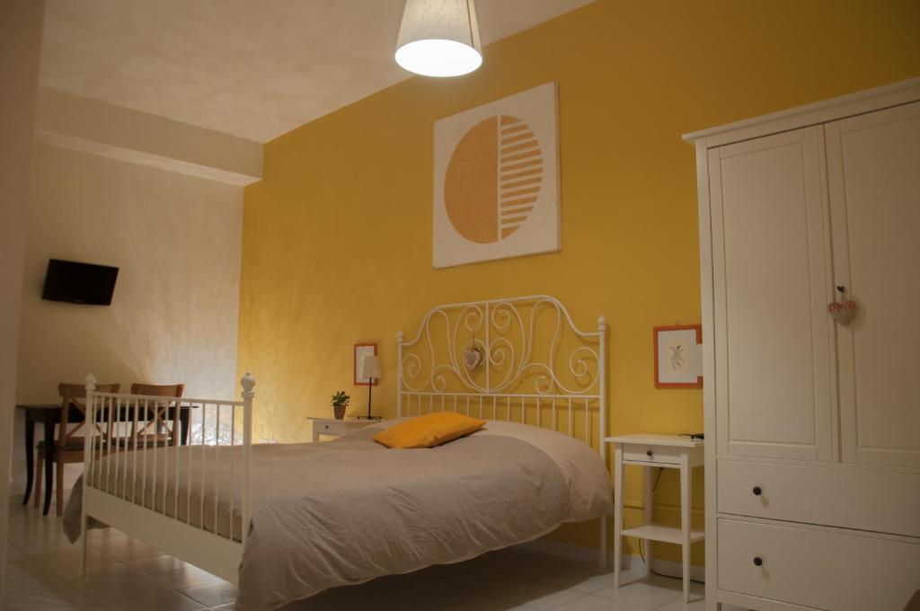 Postel nebo postele na pokoji v ubytování B&B Le Comari Salentine