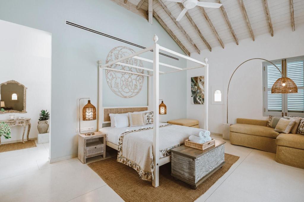 Postel nebo postele na pokoji v ubytování Selenya Talpe - Boutique Villa