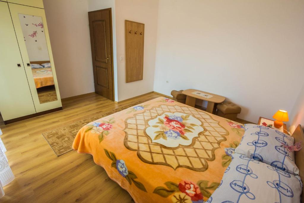 Postel nebo postele na pokoji v ubytování Apartments Villa Luciana