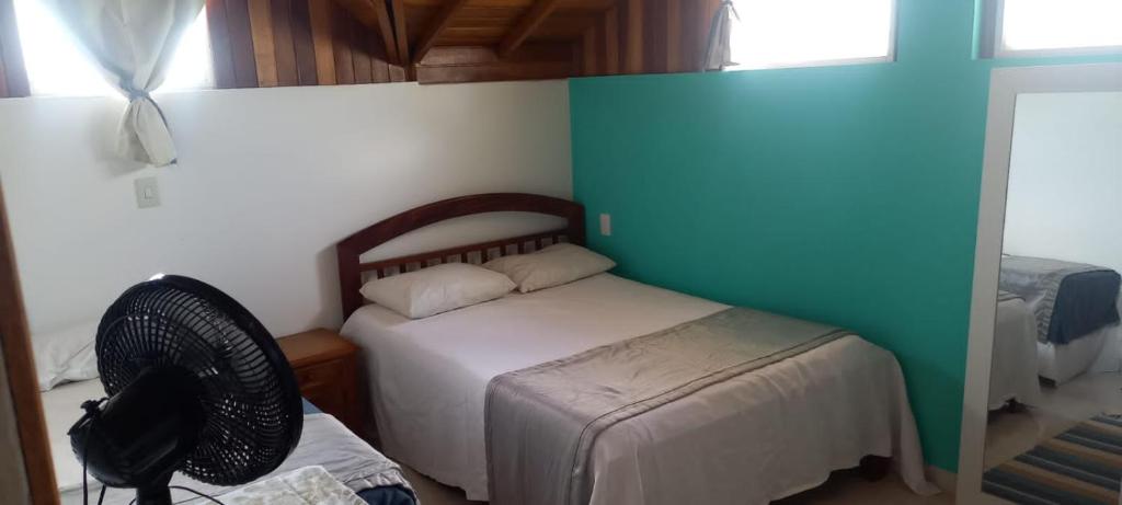 Postel nebo postele na pokoji v ubytování Chácara Rancho LG