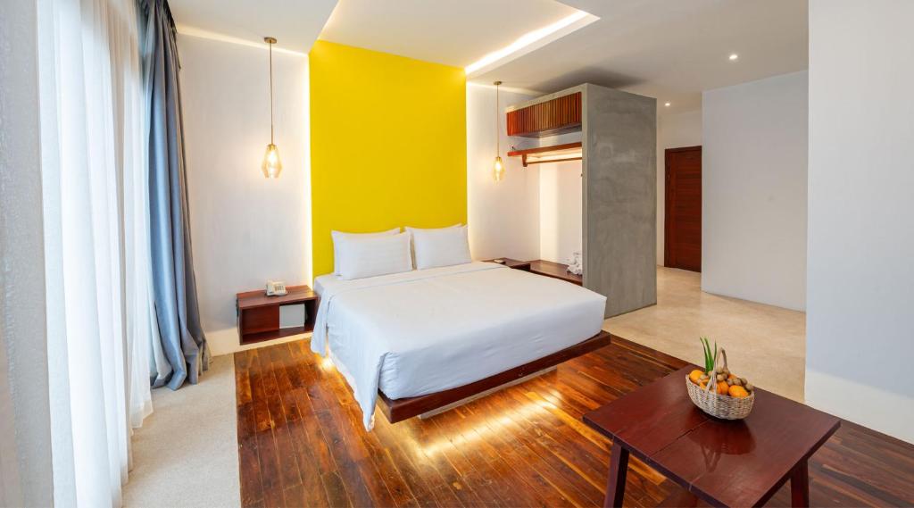 Postel nebo postele na pokoji v ubytování Victoria Central Residence