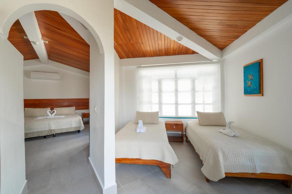 Postel nebo postele na pokoji v ubytování Hotel Fiesta