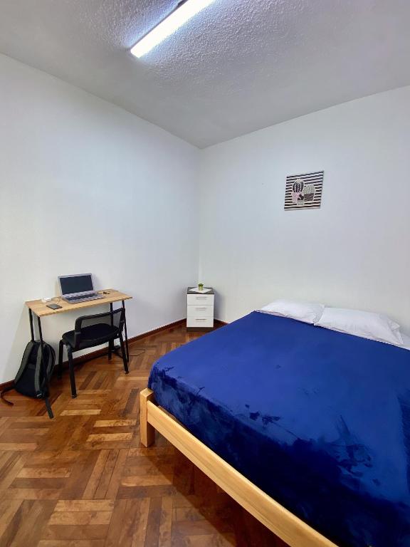 Letto o letti in una camera di Gutierrez Hostel