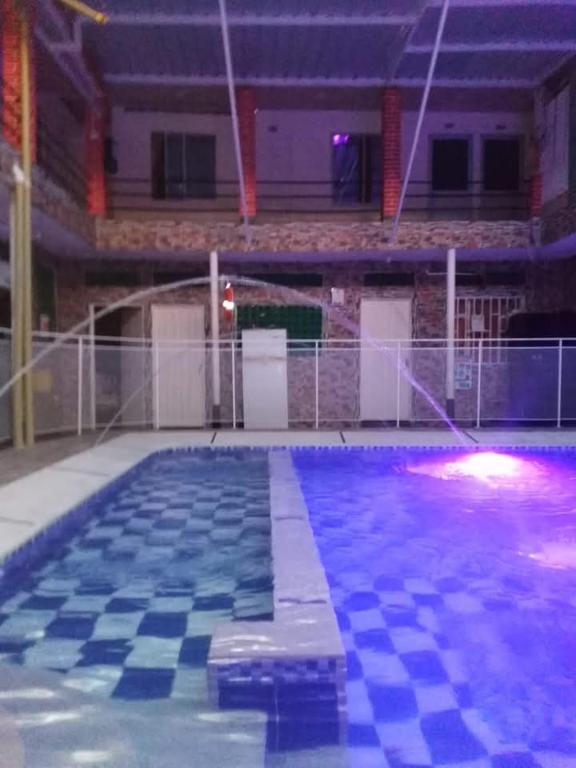 Bazén v ubytování Hotel escorpion nebo v jeho okolí