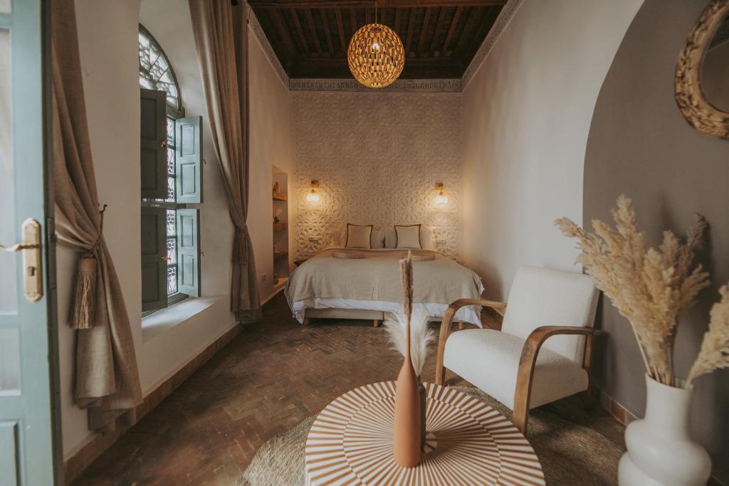 Postel nebo postele na pokoji v ubytování Riad Sierra