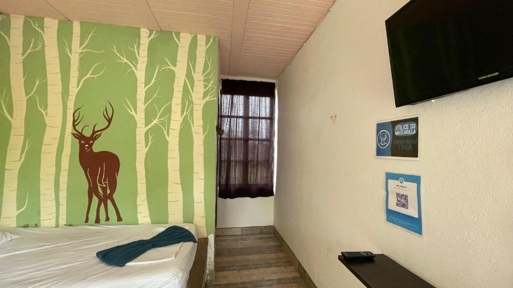 Postel nebo postele na pokoji v ubytování New Western