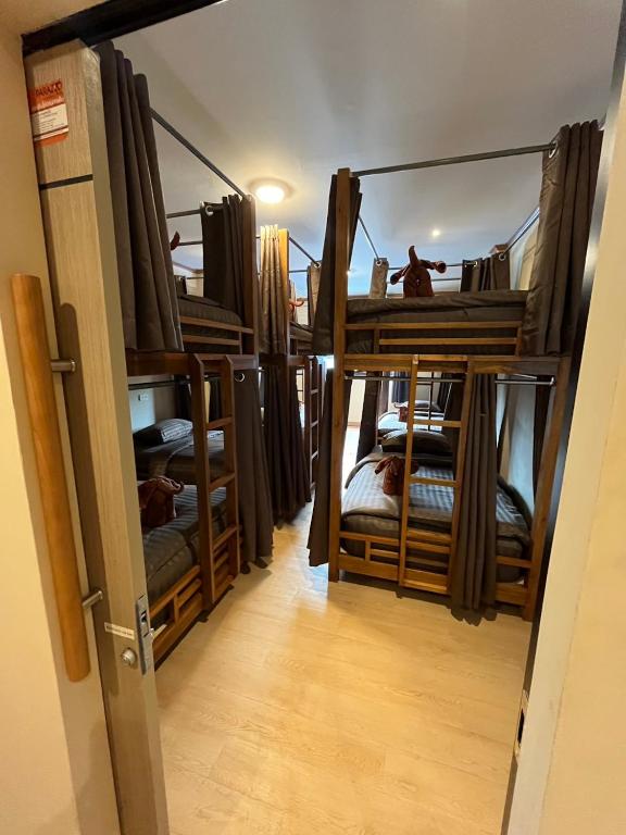Postel nebo postele na pokoji v ubytování Tian Ming Hostel