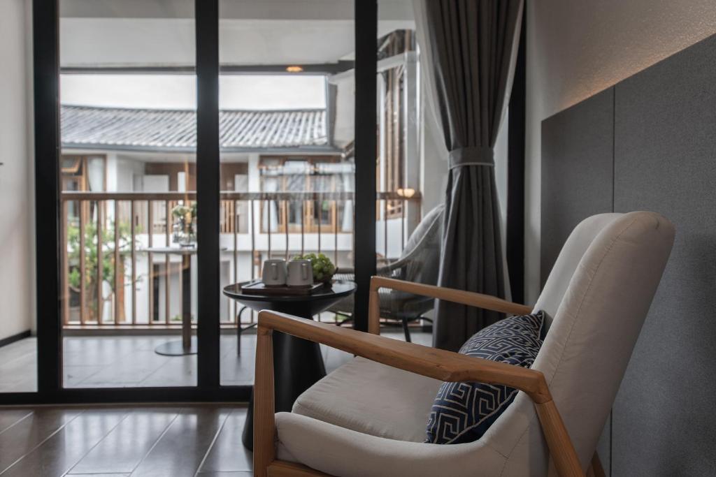 Posezení v ubytování Lijiang Liman Wenzhi No.1 Hotel