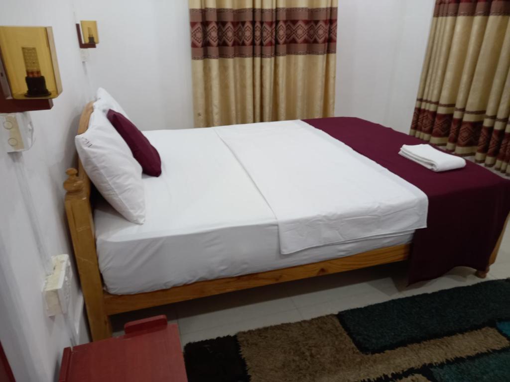 Postel nebo postele na pokoji v ubytování Peninsula hotel