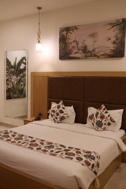 Postel nebo postele na pokoji v ubytování Labels Hotel