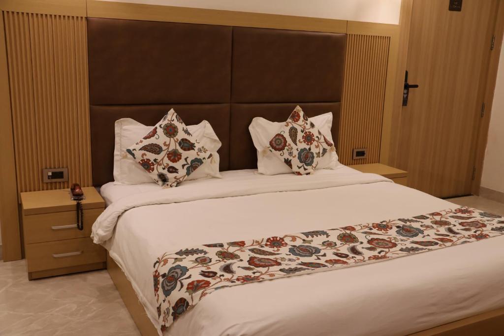 Postel nebo postele na pokoji v ubytování Labels Hotel