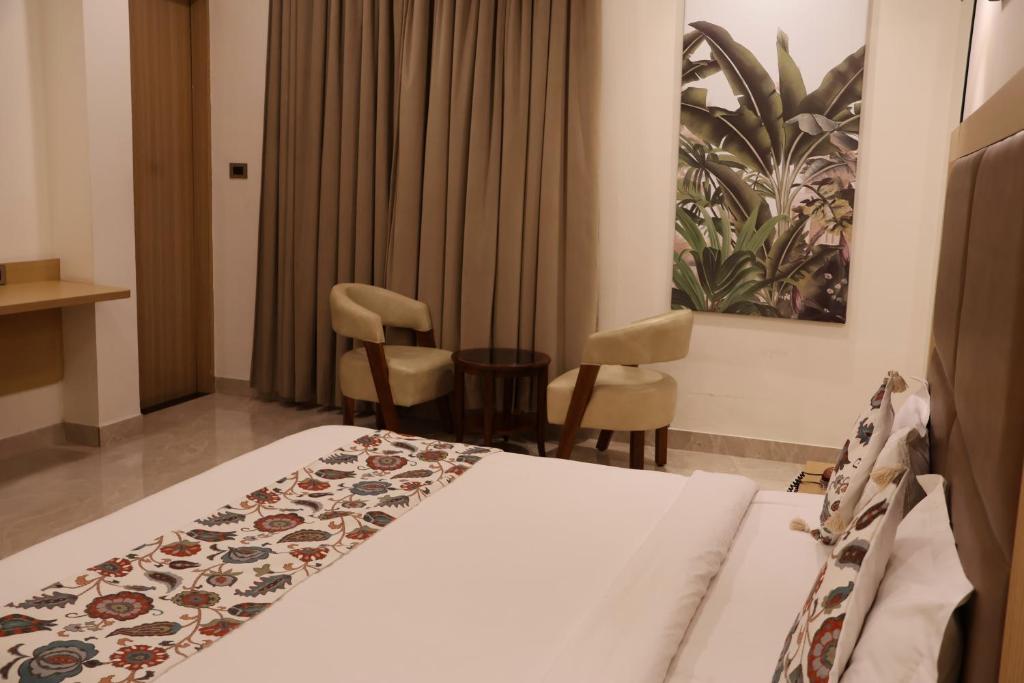Postel nebo postele na pokoji v ubytování Labels Hotel