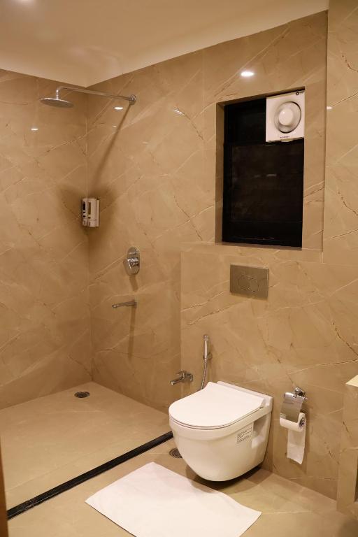 Koupelna v ubytování Labels Hotel