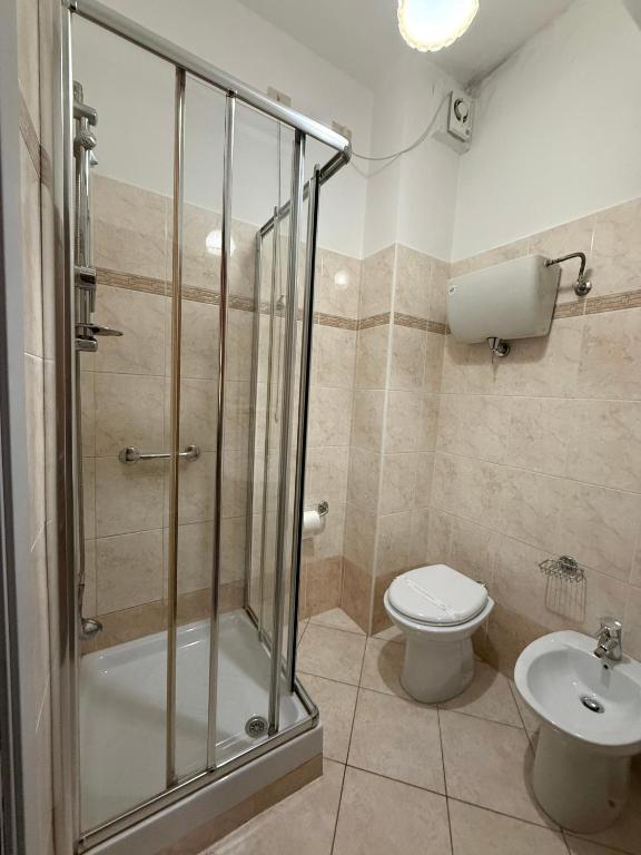 Koupelna v ubytování Grifone Hotel