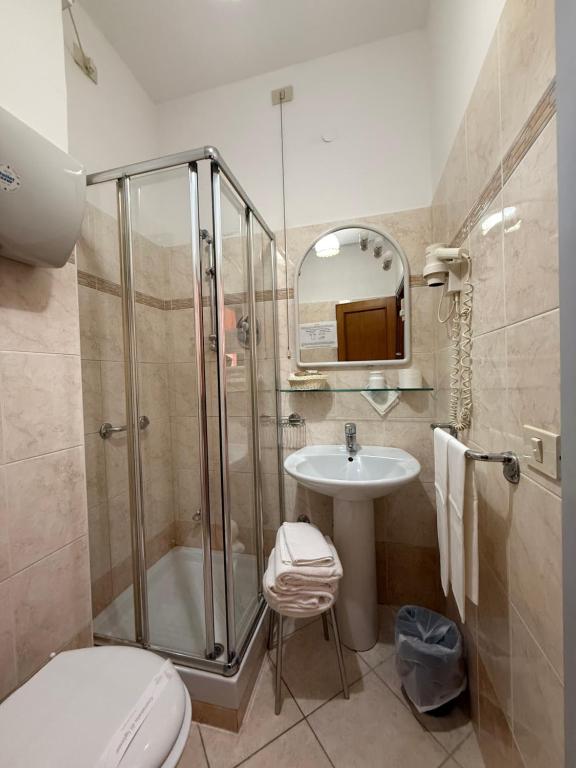 Koupelna v ubytování Grifone Hotel