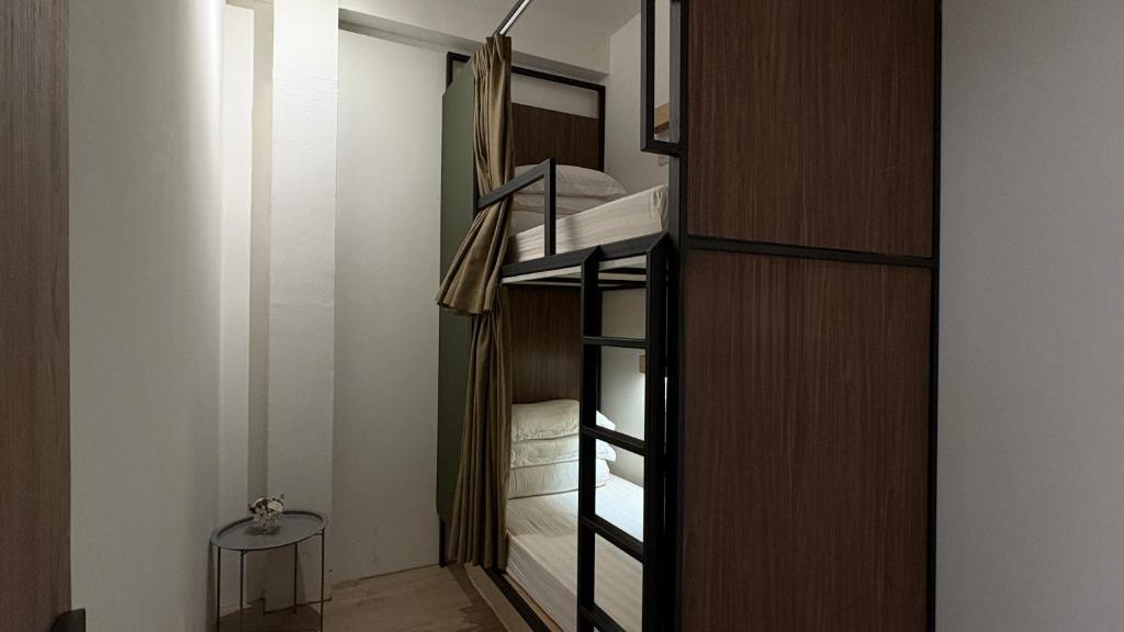 Postel nebo postele na pokoji v ubytování Jiran Hostel Kota Kinabalu