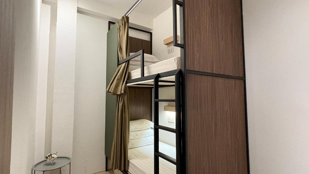Postel nebo postele na pokoji v ubytování Jiran Hostel Kota Kinabalu