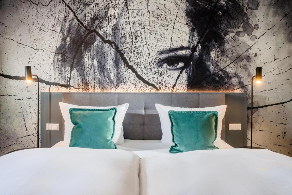 Postel nebo postele na pokoji v ubytování Hotel Görtler