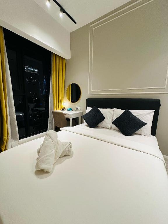 Postel nebo postele na pokoji v ubytování Residensi Akson Bukit Bintang Axon nearby Pavilion TRX