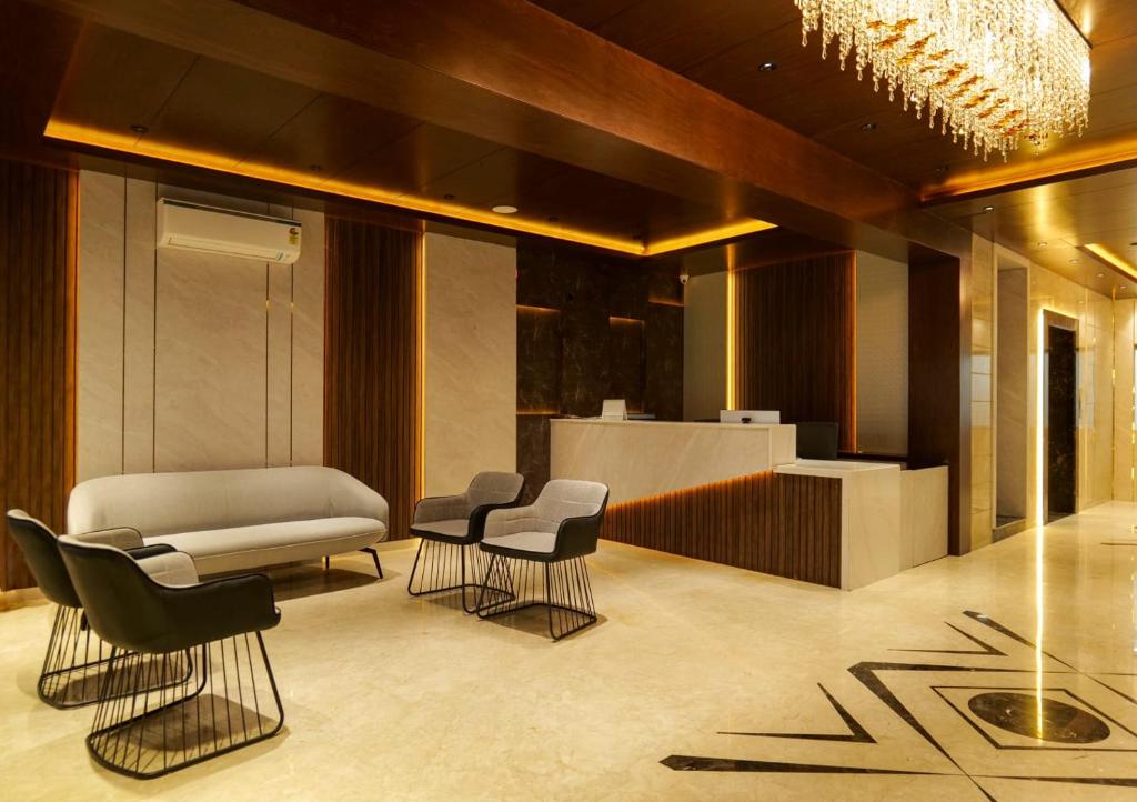 Posezení v ubytování Balu Residency - A Business Class Hotel