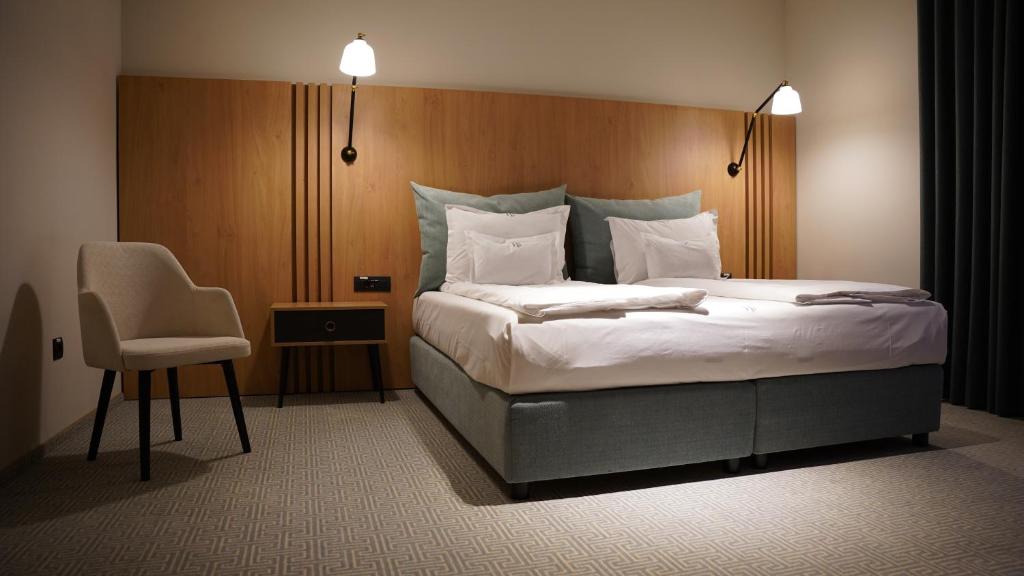 Postel nebo postele na pokoji v ubytování Hotel Sorin MIHAI