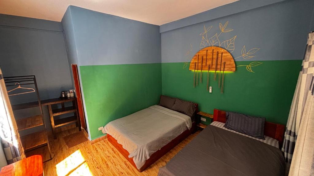 Roomy Guesthouseにあるベッド