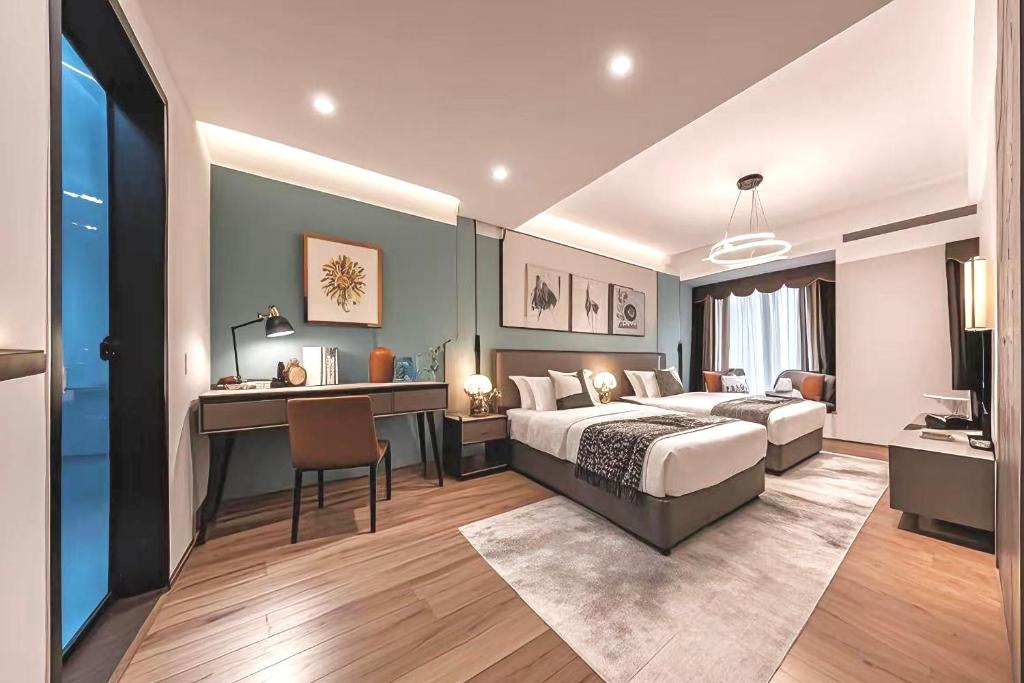Postel nebo postele na pokoji v ubytování 和樾 City View Hotel - Guangzhou Taikoo Hui Zhujiang New Town Tianhe Sports Cente-Canton Fair