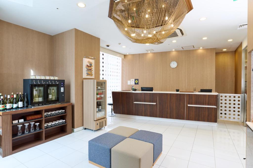 Kuchyň nebo kuchyňský kout v ubytování Ginza International Hotel