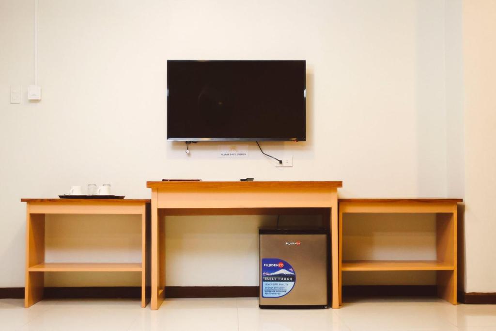 TV a/nebo společenská místnost v ubytování Surigao Royal Regency Suites