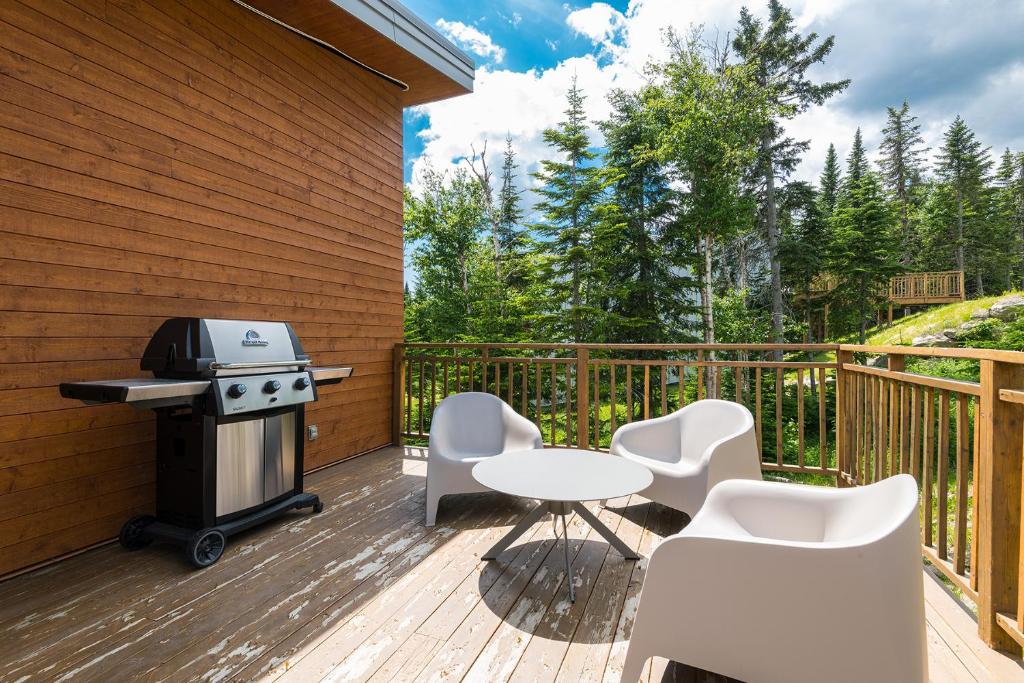 Balkón nebo terasa v ubytování Les Chalets du Massif de Charlevoix