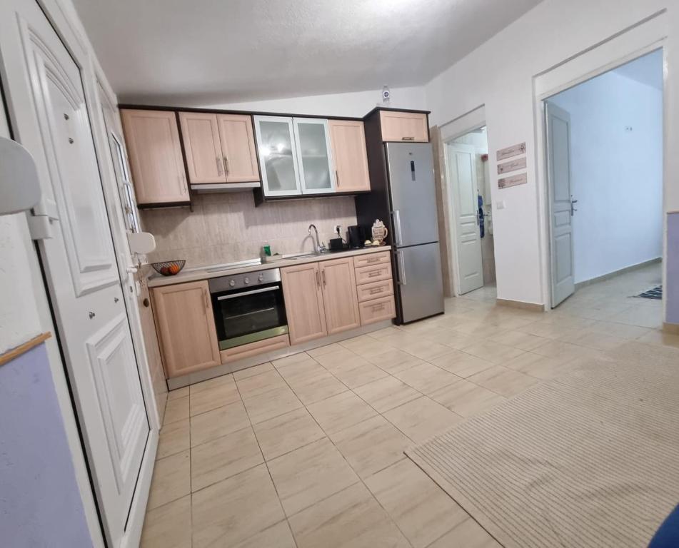 Kuchyň nebo kuchyňský kout v ubytování Roni's Place