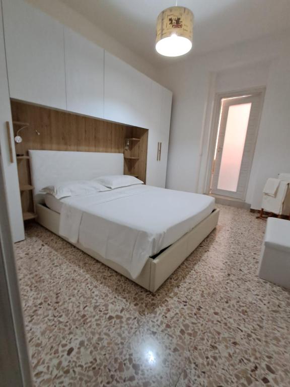 Postel nebo postele na pokoji v ubytování Camera Alghero Centro