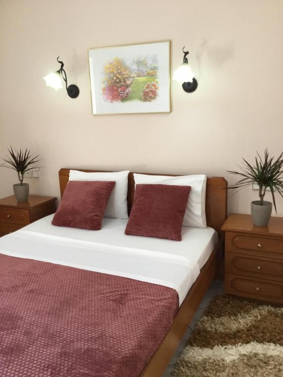 Postel nebo postele na pokoji v ubytování Hotel Triantafyllou