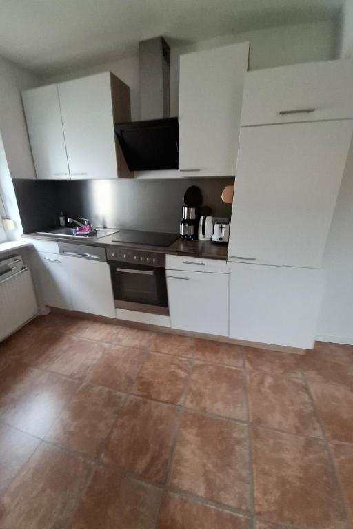 Kuchyň nebo kuchyňský kout v ubytování Gästezimmer / Weingut Peter