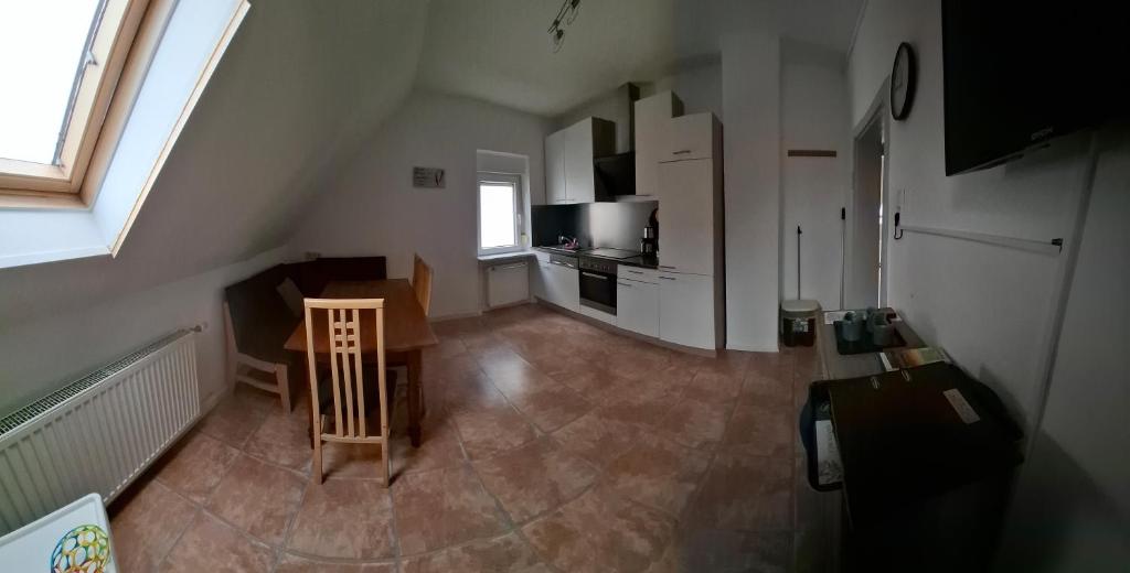 TV a/nebo společenská místnost v ubytování Gästezimmer / Weingut Peter