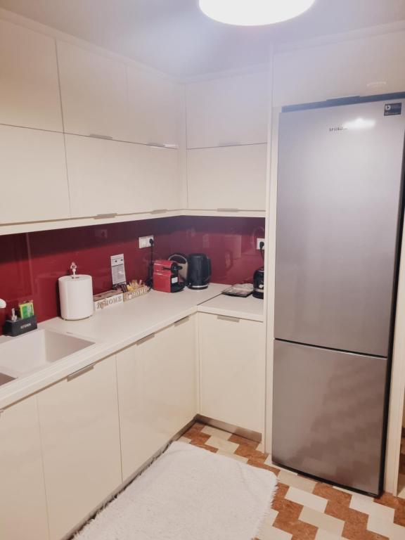 Kuchyň nebo kuchyňský kout v ubytování City Life Apartment