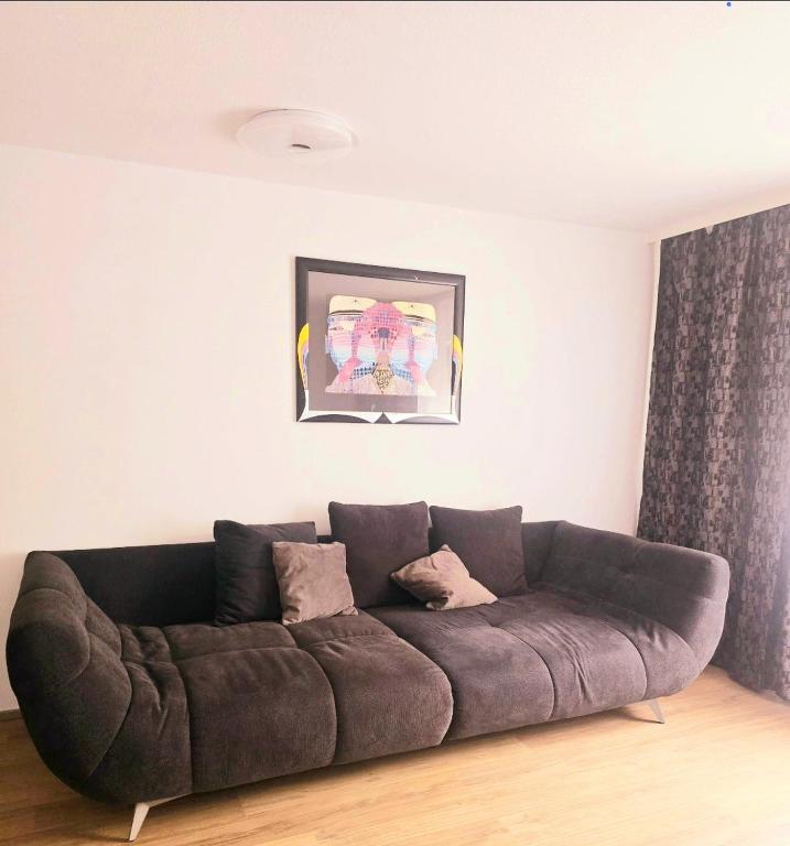 Posezení v ubytování Südhang Wohnung bei Mariahilfberg