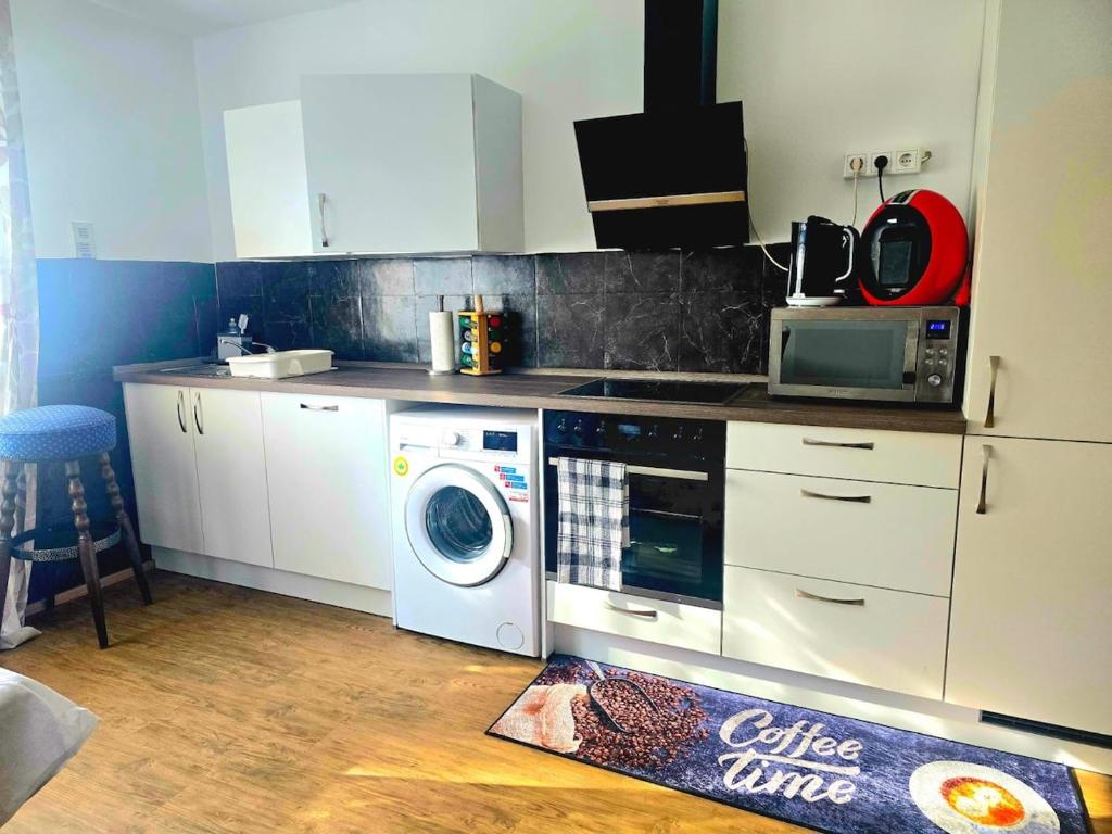 Kuchyň nebo kuchyňský kout v ubytování Südhang Wohnung bei Mariahilfberg