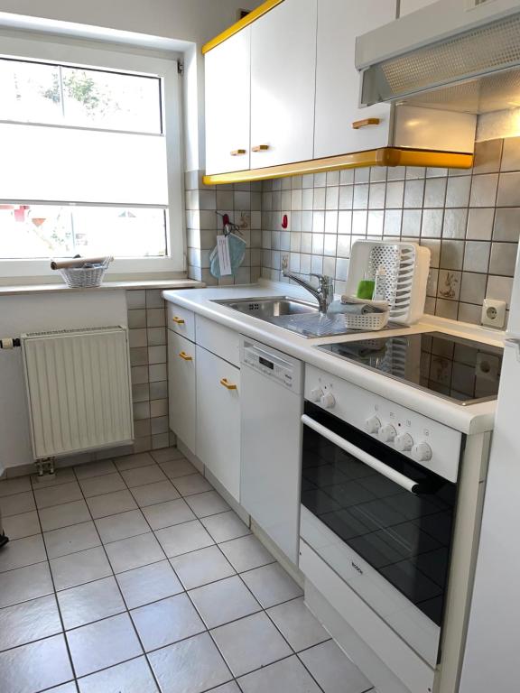 Kuchyň nebo kuchyňský kout v ubytování Ferienwohnung Nagoldtalblick