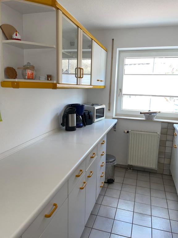 Kuchyň nebo kuchyňský kout v ubytování Ferienwohnung Nagoldtalblick